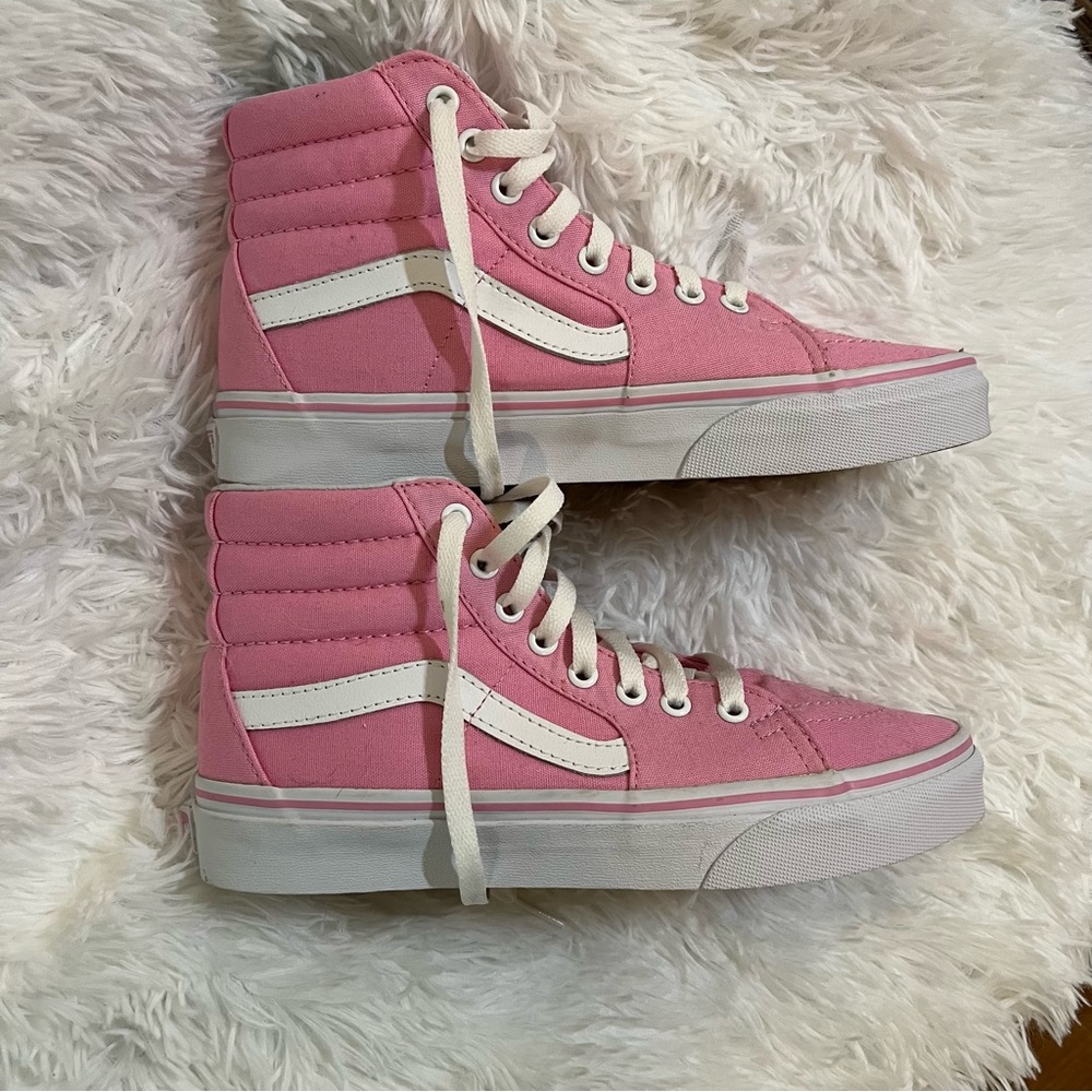 Bubblegum pink and white hi top laced Vans shoes sneakers